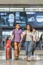 Fasionable couple at Beijing Raiway Station South, China